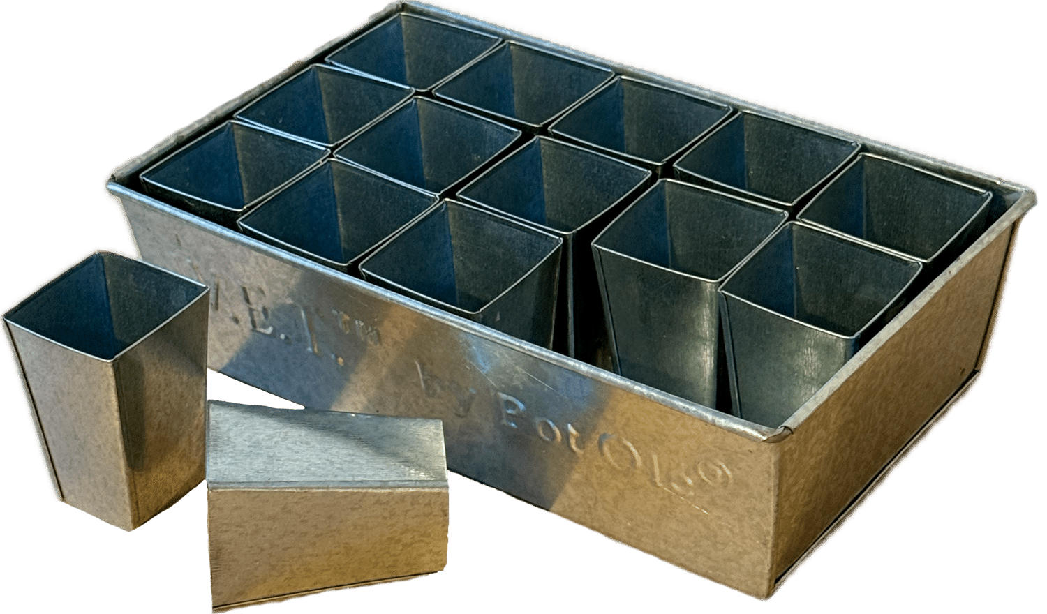 Metal propagation tray with compartments on a white background