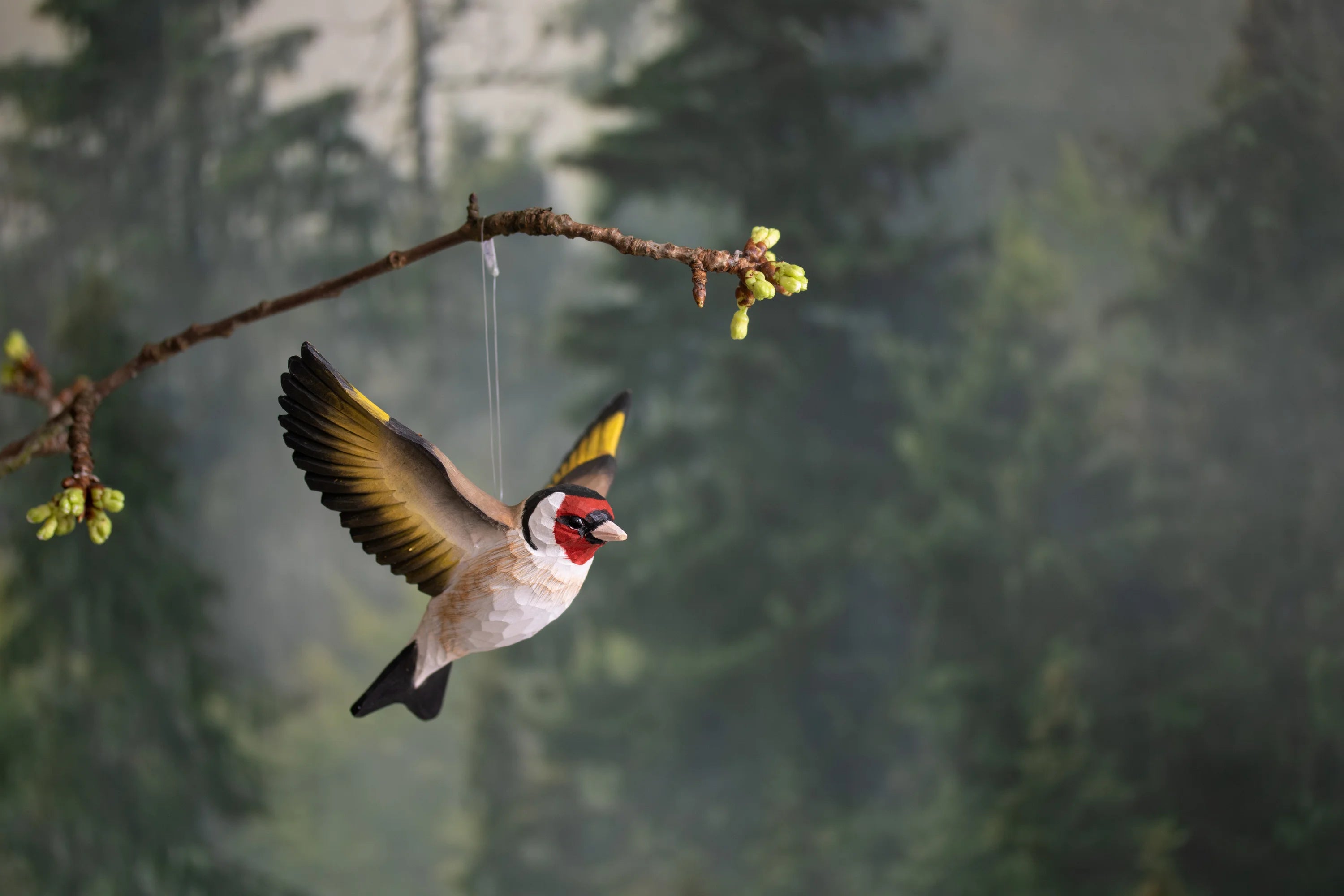 Carved Flying Goldfinch