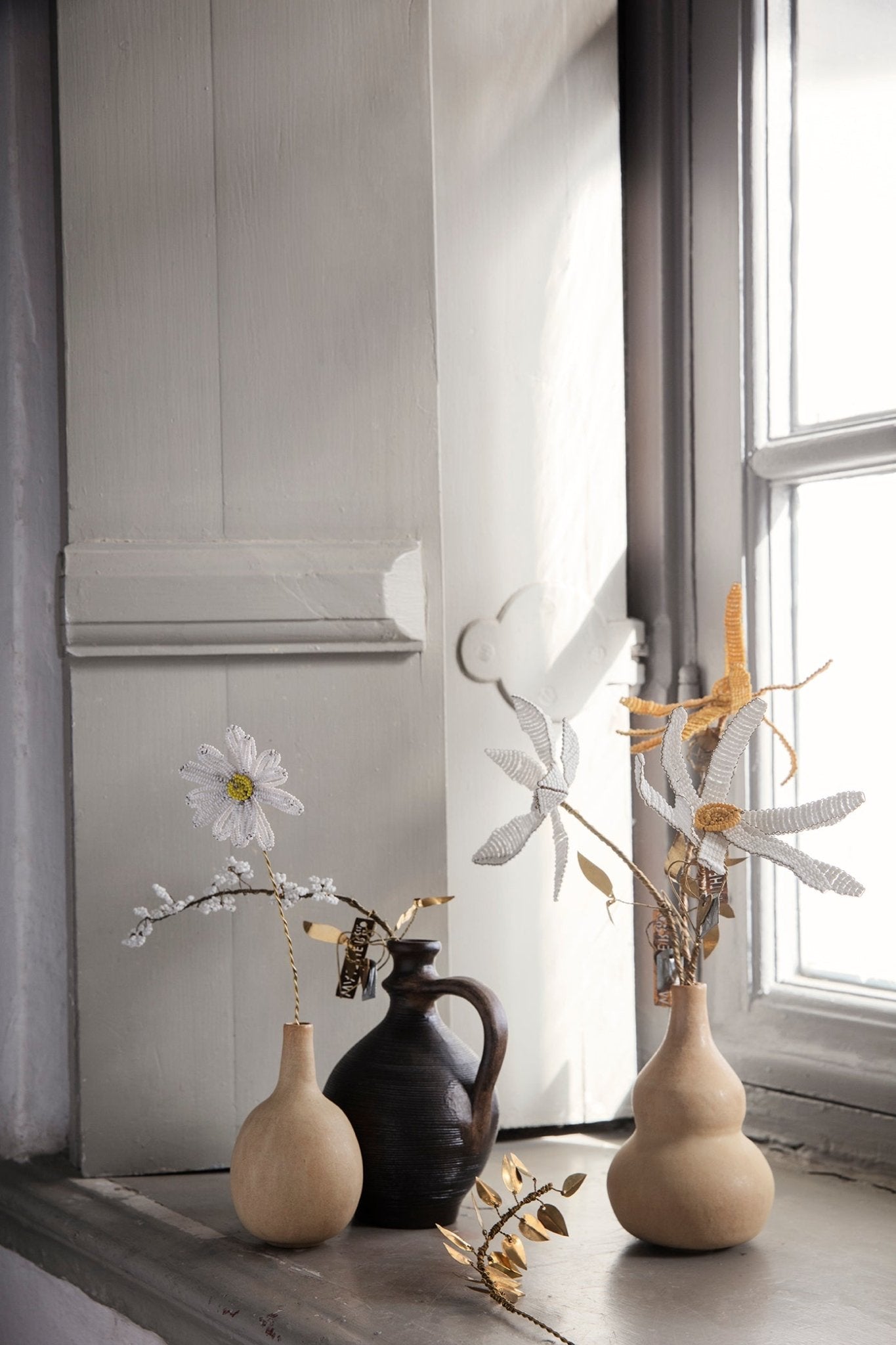 Walther and co white and yellow beads flower stem in vase