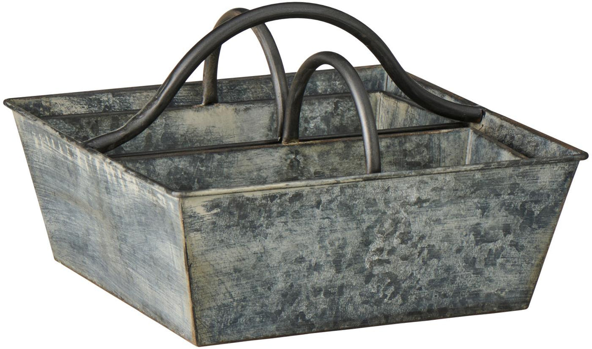 Empty grey weathered metal basket with two curved handles, angled view on a white background